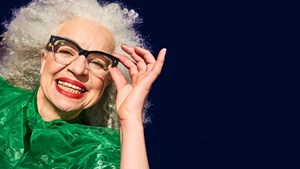 Smiling lady wearing dark glasses