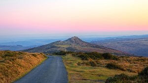 View of a road through Dartmoor at Sunset