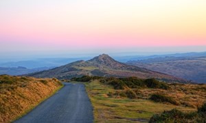 View of a road through Dartmoor at Sunset