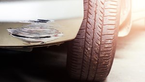 Large scratch to car rear bumper