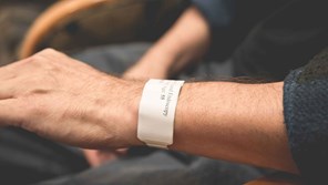 Health bracelet on persons arm