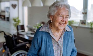 portrait-of-smiling-senior-woman-in-her-home-5_3