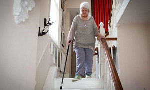 older-lady-fall-alarm-stairs-16-9-compressed