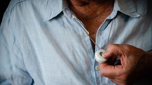 man-button-press-16-9